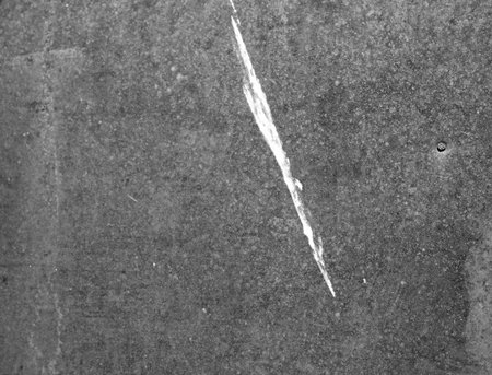 Metallic background. Black and white photo.