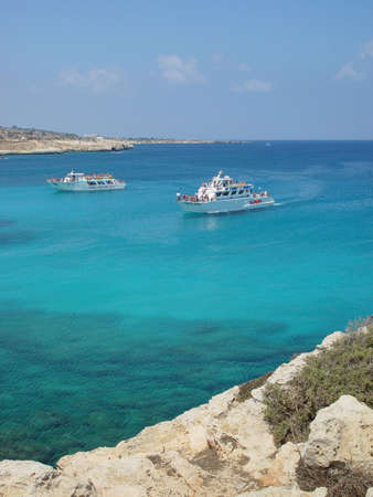 Tour boats in a small lagune in Cyprus                          の写真素材