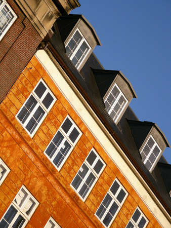 The front of an old building in the middle of the old part of Copenhagen                   の写真素材