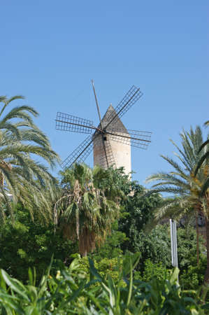 The windmills on the way to Palma de Mallorca is most symbolic to Mallorca were water-extraction mills の写真素材