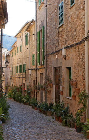 Narrow street in Valldemossa (in Catalan) or Valldemosa (in Spanish) is a village  and municipality on the island of Majorca, part of the Spanish  autonomous community  of the Balearic Islands.の写真素材