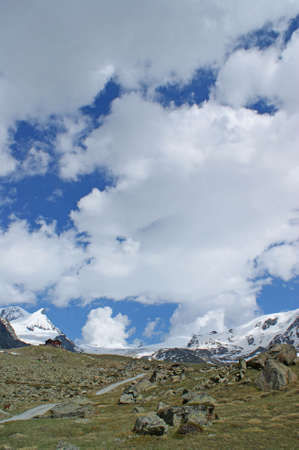 Panoramic view to snowy mountains in the distantの写真素材