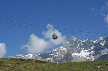 A small cable car in the swiss alps close to Matterhorn and the town of Zermattの写真素材