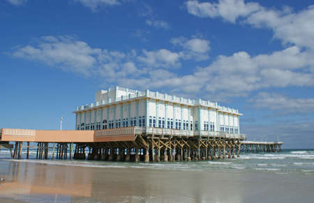 Boardwalk pier on Daytona Beach in the sunshine state of Floridaのeditorial素材