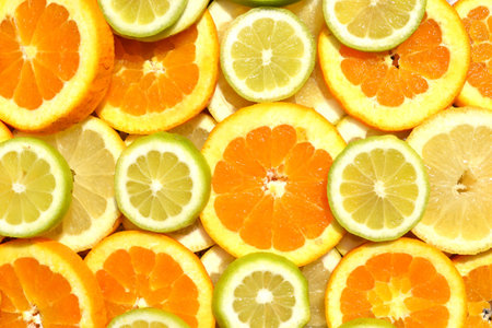 various citruses in a colorful random composition