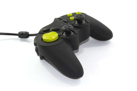 black and green joypad on a white backgroundの写真素材