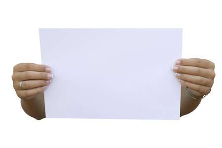 blank paper held by two woman handsの写真素材