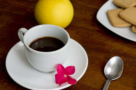 epsresso with biscuits and grapefruit on a wooden tableの写真素材