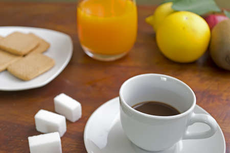cup of coffee with fruits, juice and cookiesの写真素材