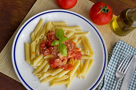 penne with tomato sauce and basilの写真素材