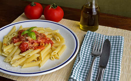penne with tomato sauce and basilの写真素材