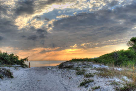 scenic sunset at the beach in sardiniaの写真素材