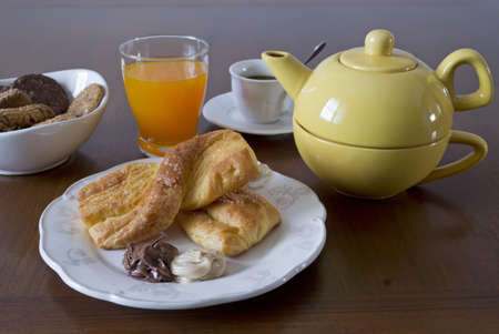 breakfast set with snack, fruit juice, cookiesの写真素材