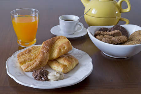 breakfast set with snack, fruit juice, cookiesの写真素材