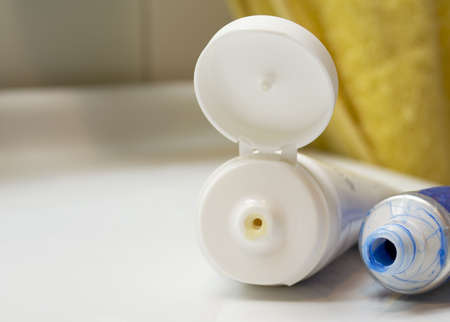 two tubes on a white sinkの写真素材
