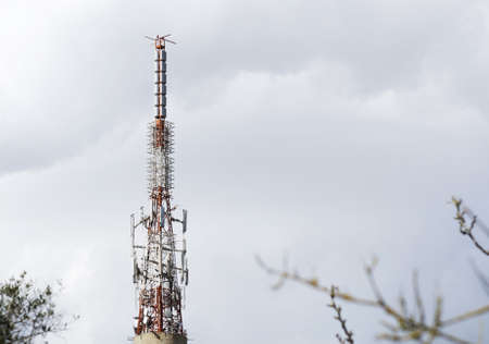 tv antenna under an overcast skyの写真素材