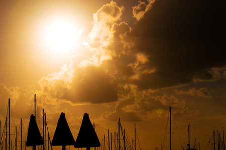 three signal silhouettes at sunset