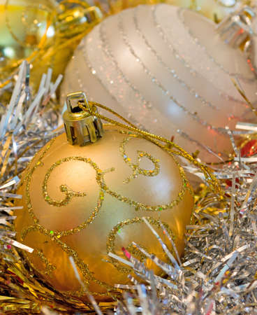 detail golden Christams ball among decorationsの写真素材