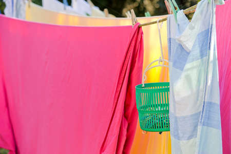 washing on the line with colorful pegsの写真素材