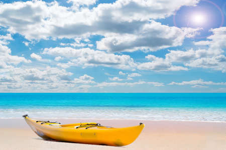 kayak on a pink paradise beach on a sunny day in Sardiniaの写真素材
