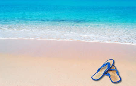 pink paradise beach with flip flop on a sunny day in Sardiniaの写真素材