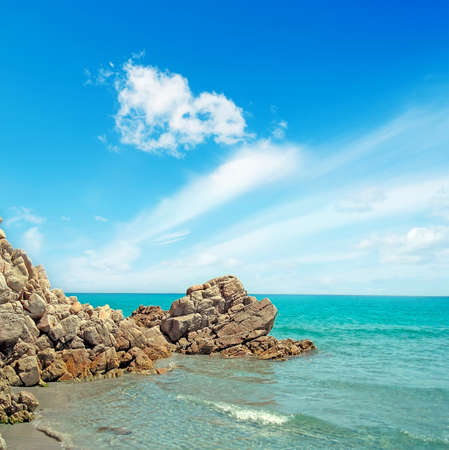 rocks and emerald water in sardiniaの写真素材