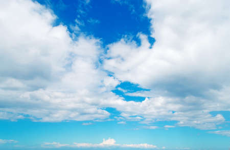 blue sky with white cloudsの写真素材