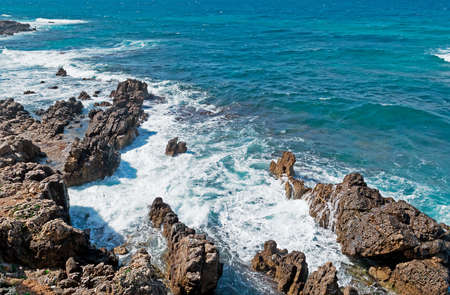 rocky shore in Algheroの写真素材