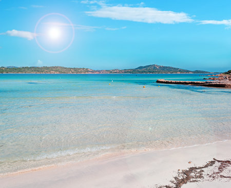 brandinchi cove on a clear day with lens flareの写真素材