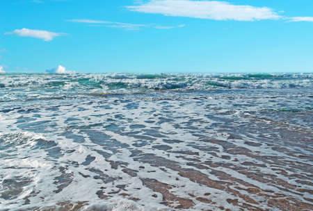 Castelsardo rocky shore and blue skyの写真素材