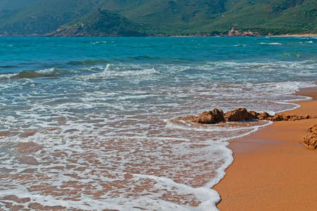 Porto Ferro golden shore on a windy dayの写真素材