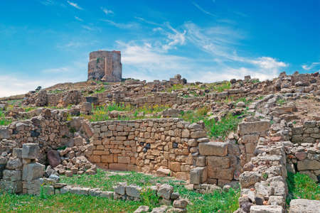 San Giovanni tower seen from Tharros archeological siteの写真素材