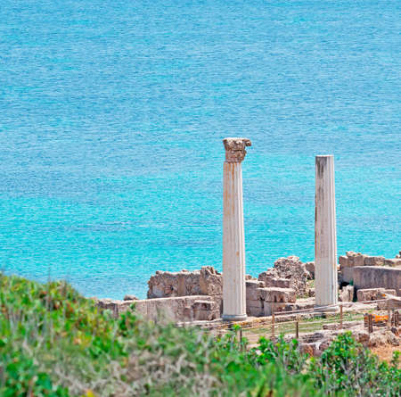 Tharros columns by Sardinia seaの写真素材