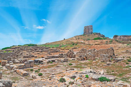 San Giovanni tower seen from Tharros archeological siteの写真素材