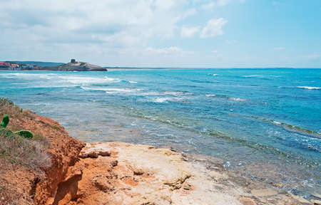 detail of a Sardinia rocky shore on a cloudy dayの写真素材