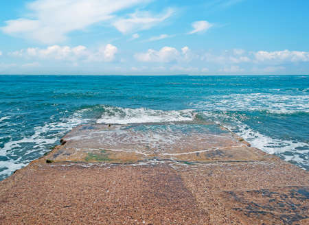 cement ramp in the waterの写真素材