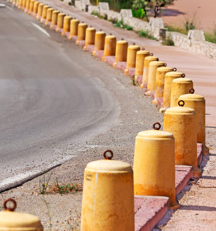 cement pylons along the road