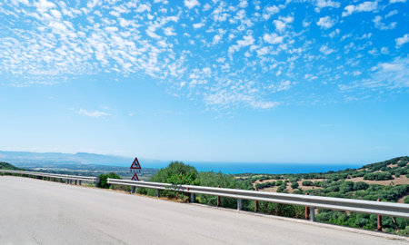 panoramic view of a country road along the coastlineの写真素材