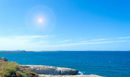 Porto Torres coastline on a clear, sunny dayの写真素材