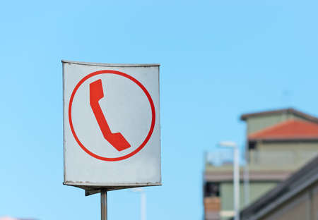 phone sign on a call boxの写真素材