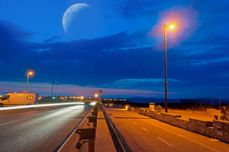 cycling lane and road by nightの写真素材