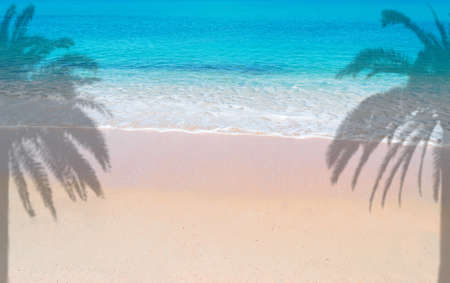 pink paradise beach with palms on a sunny day in Sardiniaの写真素材