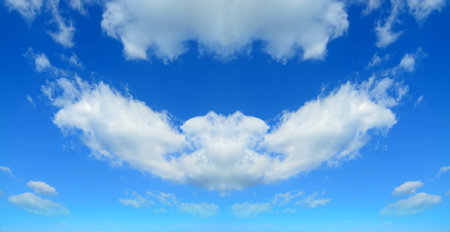 symmetrical cloudscape in a blue sky
