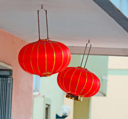 traditional chinese lanterns in a urban streetの写真素材