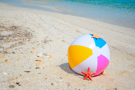 beach ball by a turquoise shore in Sardinia