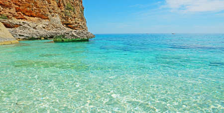 cala biriola shore on a clear dayの写真素材