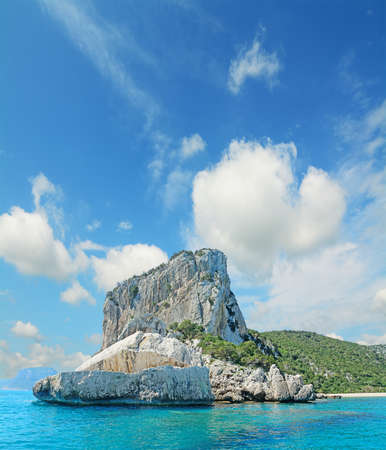 huge cliff by Cala Luna shoreline, Sardiniaの写真素材