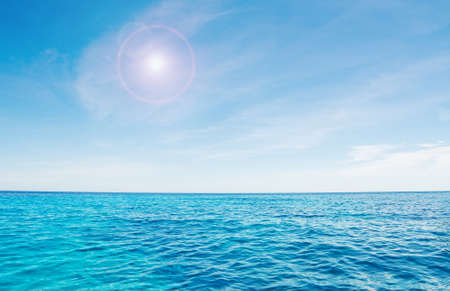 blue sea and bright sun in Sardiniaの写真素材