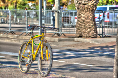yellow bike in Alghero, Sardiniaの写真素材