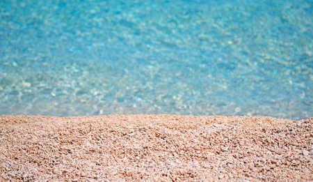 pebbles by the shore in Cala Luna, Sardiniaの写真素材